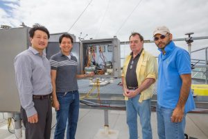 Installation of the UM PRECISE sensor on the rooftop of a building at the Rosenstiel School.